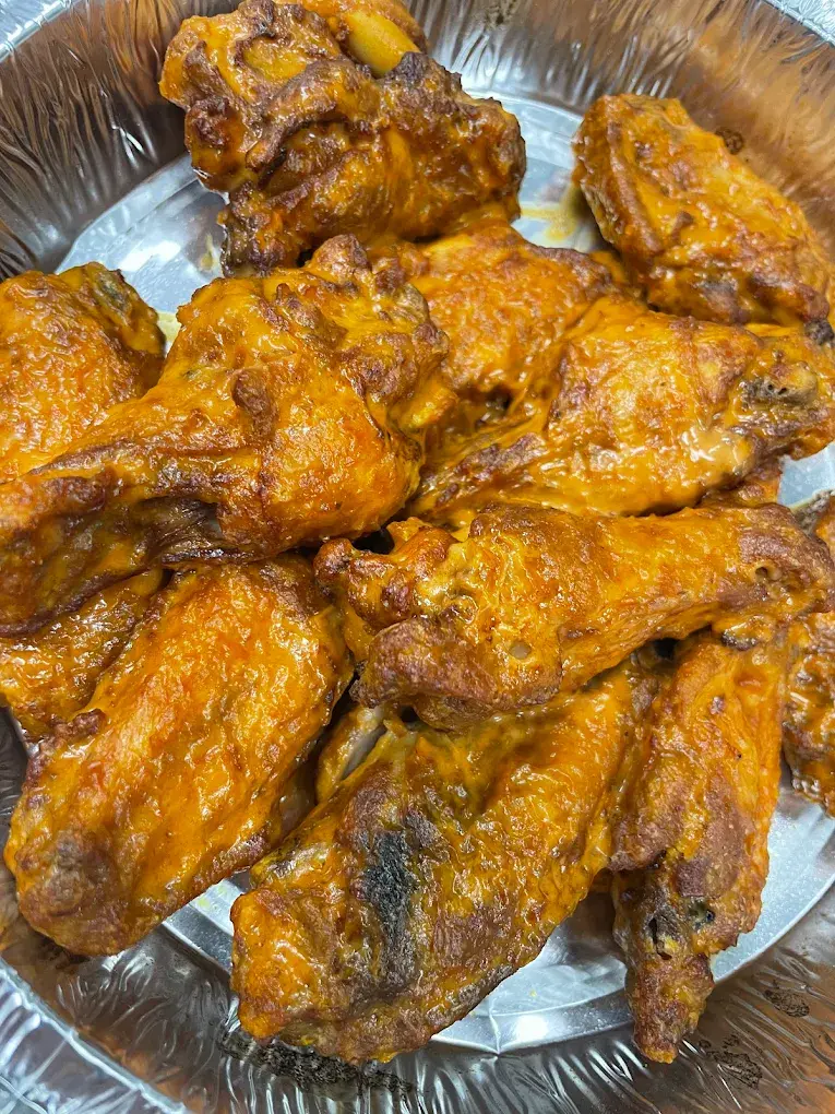 Butter Chicken Pizza at Pizza64 Beaumont